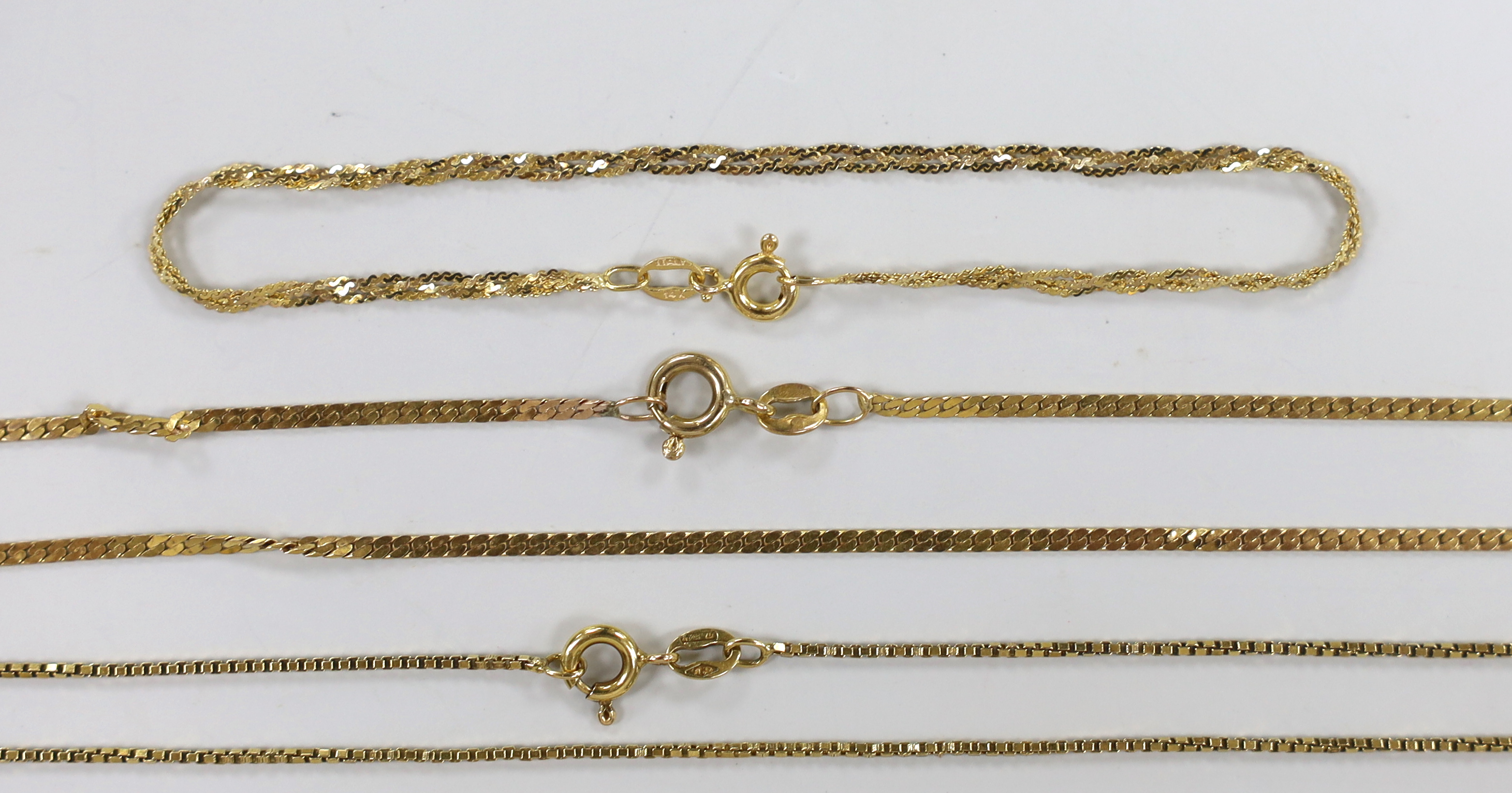 A modern 18k fine link chain, 40cm, 3.4 grams, two 14k bracelets, 2.7 grams, three 9ct chains (2 a.f.)and a damaged 9ct bracelet, 7 grams.